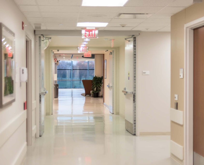 Hospital hallway with bright flourescent lights